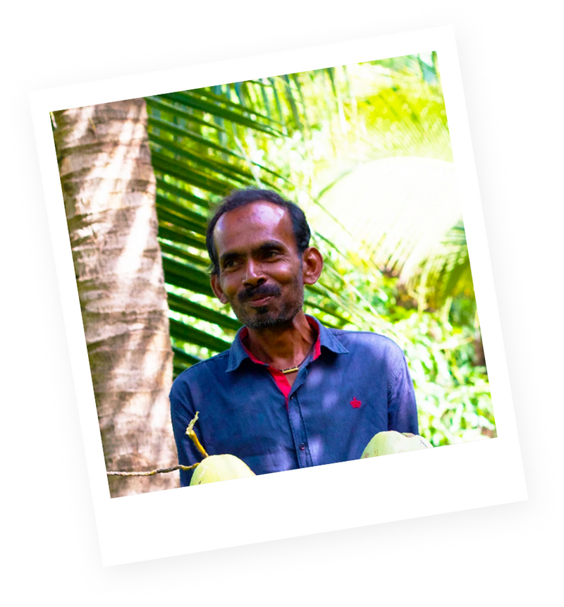 polaroid picture of coconut farmer